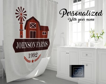 May include: A white shower curtain with a red barn and windmill graphic. The text "Johnson Farms 1992" is printed on the curtain.