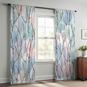 a room with a window, curtains, and a wooden dresser. The curtains have a leafy, tree-like pattern in shades of blue, pink, and green.