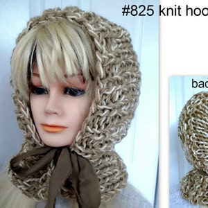 May include: A knitted hood pattern in beige and white yarn, displayed on a mannequin. The hood has a textured appearance and a brown tie. The image includes the text "#825 knit hood pattern" and a back view of the hood.