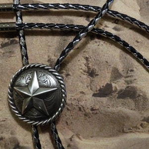 Silver Star with Rope Trim Bolo Tie - Dressy Silver and Black Cord - Silver Finish Tips