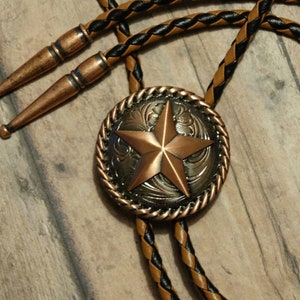 Copper Finish Rope Edge Star Bolo Tie - Black and Brown Leather Cord - Copper Finish Tips