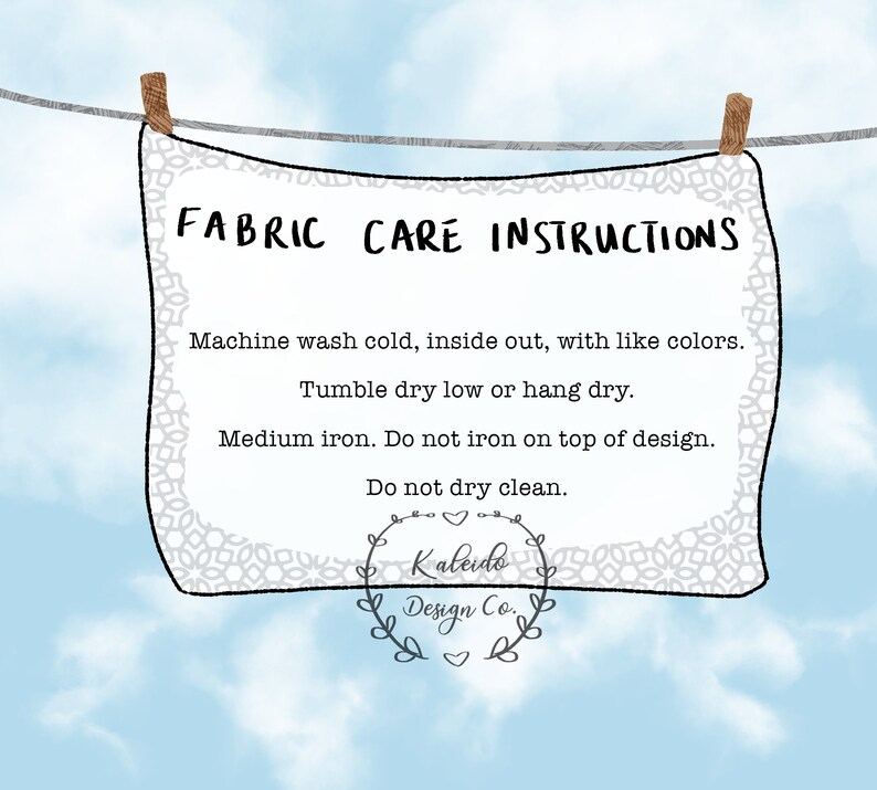 May include: A white fabric care label with black text hanging on a clothesline against a blue sky background. The label reads "FABRIC CARE INSTRUCTIONS" and includes instructions for washing, drying, and ironing the fabric. The label also includes the text "Kaleido Design Co."