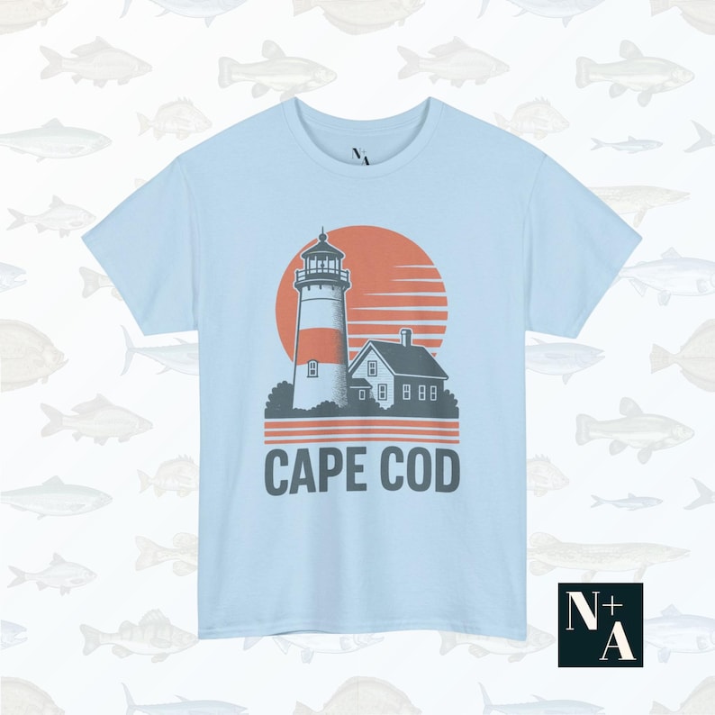 Cape Cod lighthouse t-shirt in light blue with retro sunset graphic and vintage coastal vibe