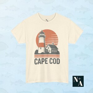 Cape Cod vintage aesthetic tee in cream with 80s lighthouse artwork and summer fisherman theme