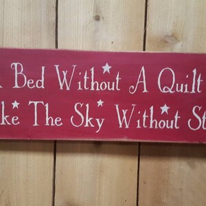 Bed Without A Quilt Is Like The Sky Without Stars distressed wooden sign