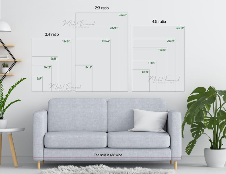 May include: A white sofa with a 68-inch width, positioned in front of a white wall with various sizes of framed artwork displayed. The artwork is labeled with different aspect ratios and dimensions in inches.