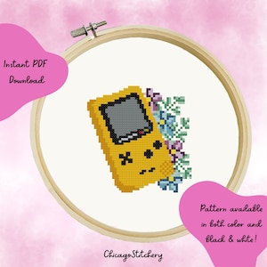 May include: A cross-stitch pattern of a yellow handheld video game console with a floral design. The pattern is available in both color and black and white.