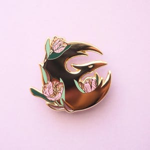 Pin de esmalte de pájaro estrella