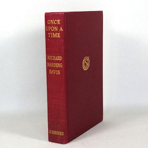 May include: A red hardcover book titled "Once Upon A Time" by Richard Harding Davis. The book is published by Scribners.