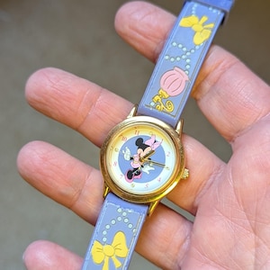Montre Disney Mini Mouse vintage dorée avec noeuds et flacons de parfum, bande synthétique, dessin animé, batterie neuve, filles, femmes unisexe