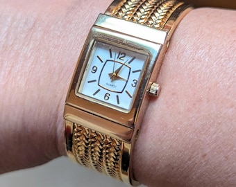 Bracciale vintage color oro con polsino: dettaglio in corda intrecciata