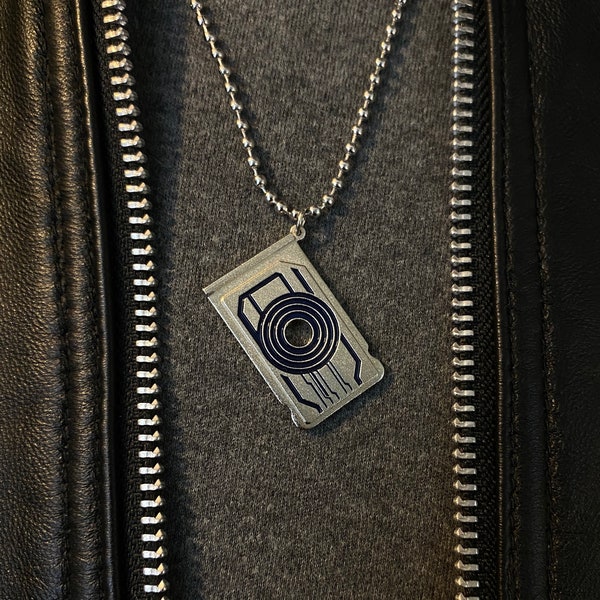 Sam Flynn's memory chip necklace Tron
