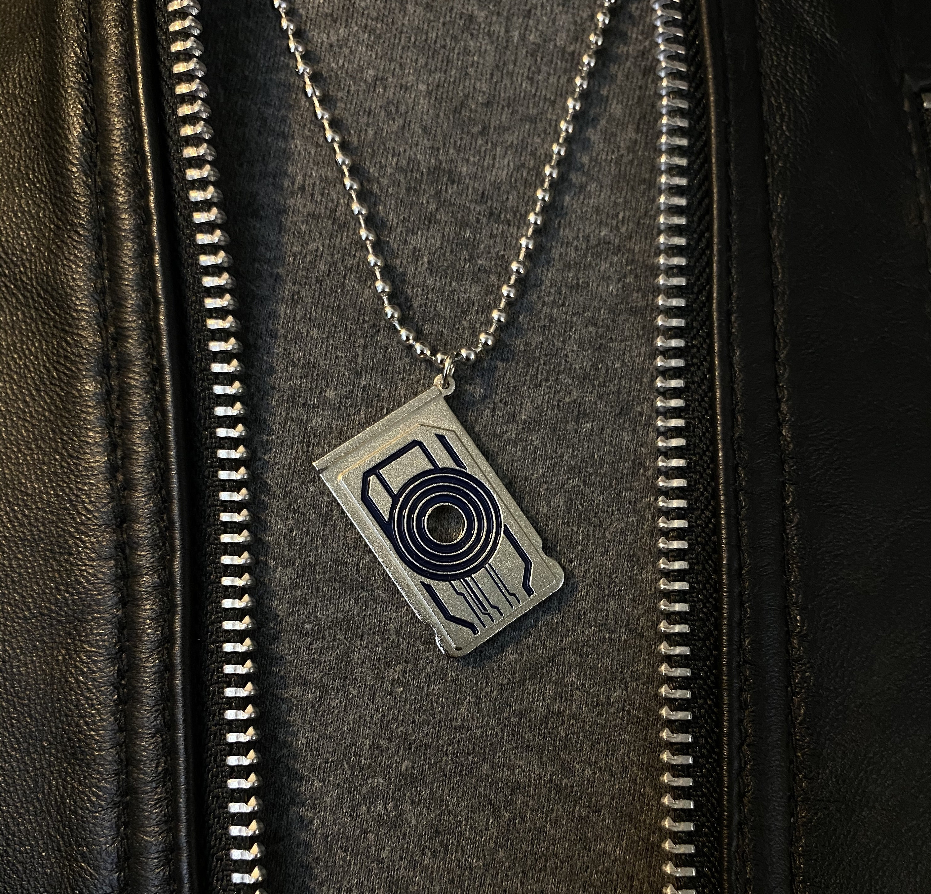 Sam's memory chip necklace