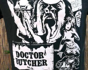 Vintage Dr. Butcher M.D. Medical Deviant (1980) camiseta mediana con etiqueta Fruit of the Loom