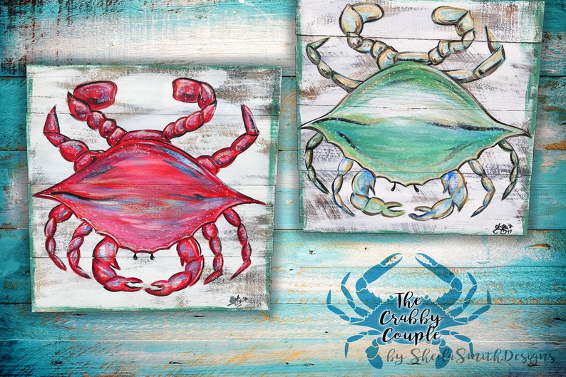 May include: Two painted wooden signs featuring a red crab and a blue crab on a white background. The signs are on a blue and green wood background. The text "The Crabby Couple by Sheila Smith Designs" is at the bottom of the image.