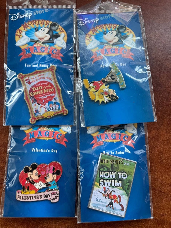 Set of 4 Disney Magic Collectible pin bundle