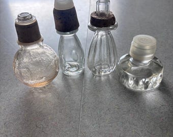 Vintage Set of 4 Glass decanter or bottle stoppers