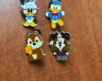 Set of 4 collectible Disney Pins-Donald Duck, Minnie and Chip with Acorn