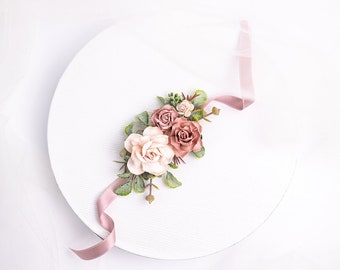 Wedding wrist corsage with roses, peonies, eucalyptus and ruscus in sage green, blush pink, dusty pink, mauve, peach, maroon