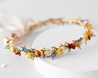 Romantic flower crown with dried flowers in warm autumn colors. Bridal flower hair wreath, fairy crown, wedding headband, meadow headpiece