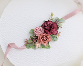 Wedding wrist corsage with roses, peonies, eucalyptus and ruscus in burgundy, dusty pink, blush pink