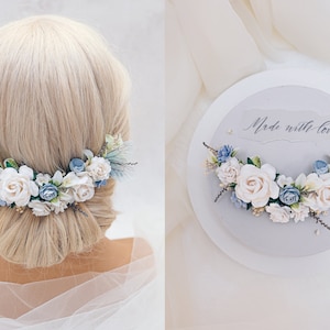 Bridal headpiece with blue and white flowers, dried Baby's breath, preserved stoebe and delicate butterfly wings. Romantic wedding hair vine