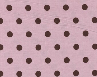 Cotton fabric printed with chocolate peas on pink background