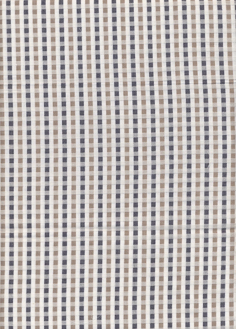 Organic fabric with small navy, beige and white tiles image 1