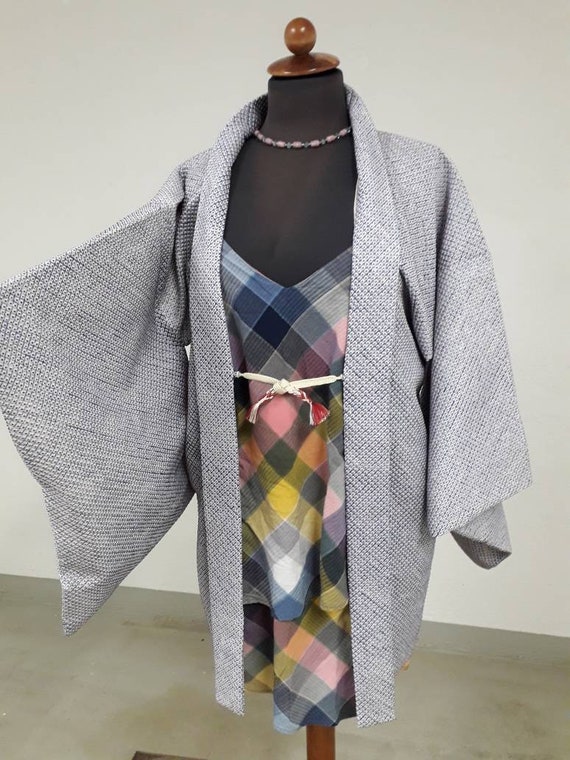 Pale blue tie-dye kimono jacket, shows an boho sty