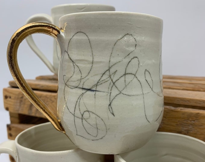 White Mug with Scribbles and Gold Handle