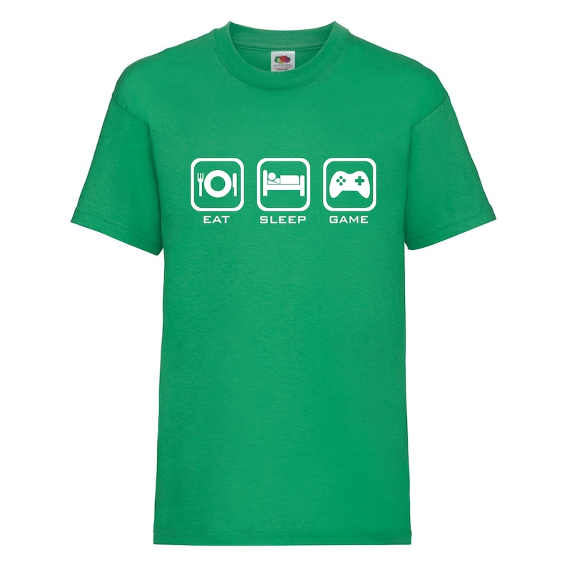 May include: Green t-shirt with a white graphic that says "Eat Sleep Game" with icons for each word.