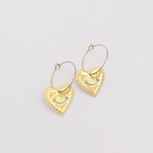 Milagro hoop earrings, hoop earrings gilded with 24 carat fine gold, original creation. Marine Mistake sacred hearts hoop earrings. image 1