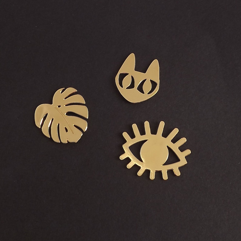 pins gilded with fine gold and silver cat monstera eye image 1