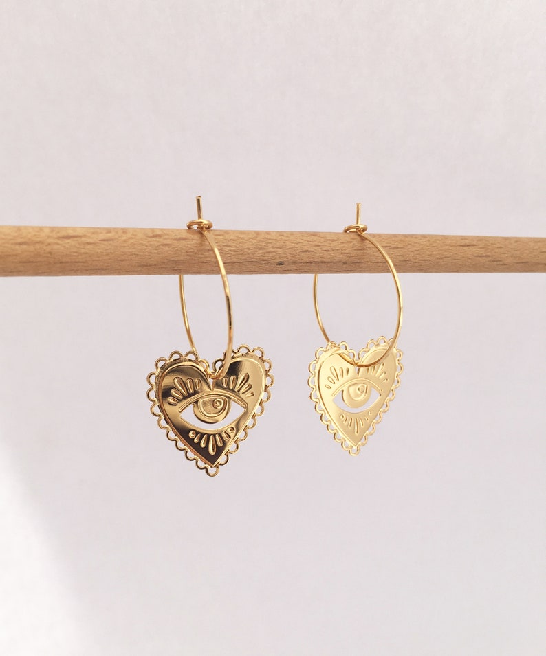 Milagro hoop earrings, hoop earrings gilded with 24 carat fine gold, original creation. Marine Mistake sacred hearts hoop earrings. image 2