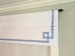 Faux (fake) flat roman shade valance, with greek key banding grosgrain ribbon. Bluebird Ribbon.