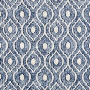 May include: A blue and white patterned rug with a geometric design. The rug has a subtle distressed look, giving it a vintage feel.