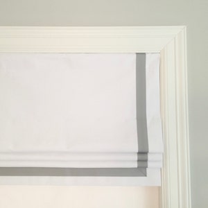 Faux (fake) flat roman shade valance with Millennium Silver grosgrain ribbon trim.  White twill cotton fabric, you choose ribbon color.