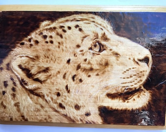 Hand-Burned Snow Leopard on Pine