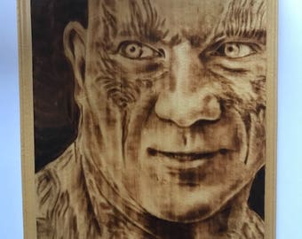 Hand-Burned Drax the Destroyer on Pine