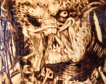 Hand-Burned Predator on Pine