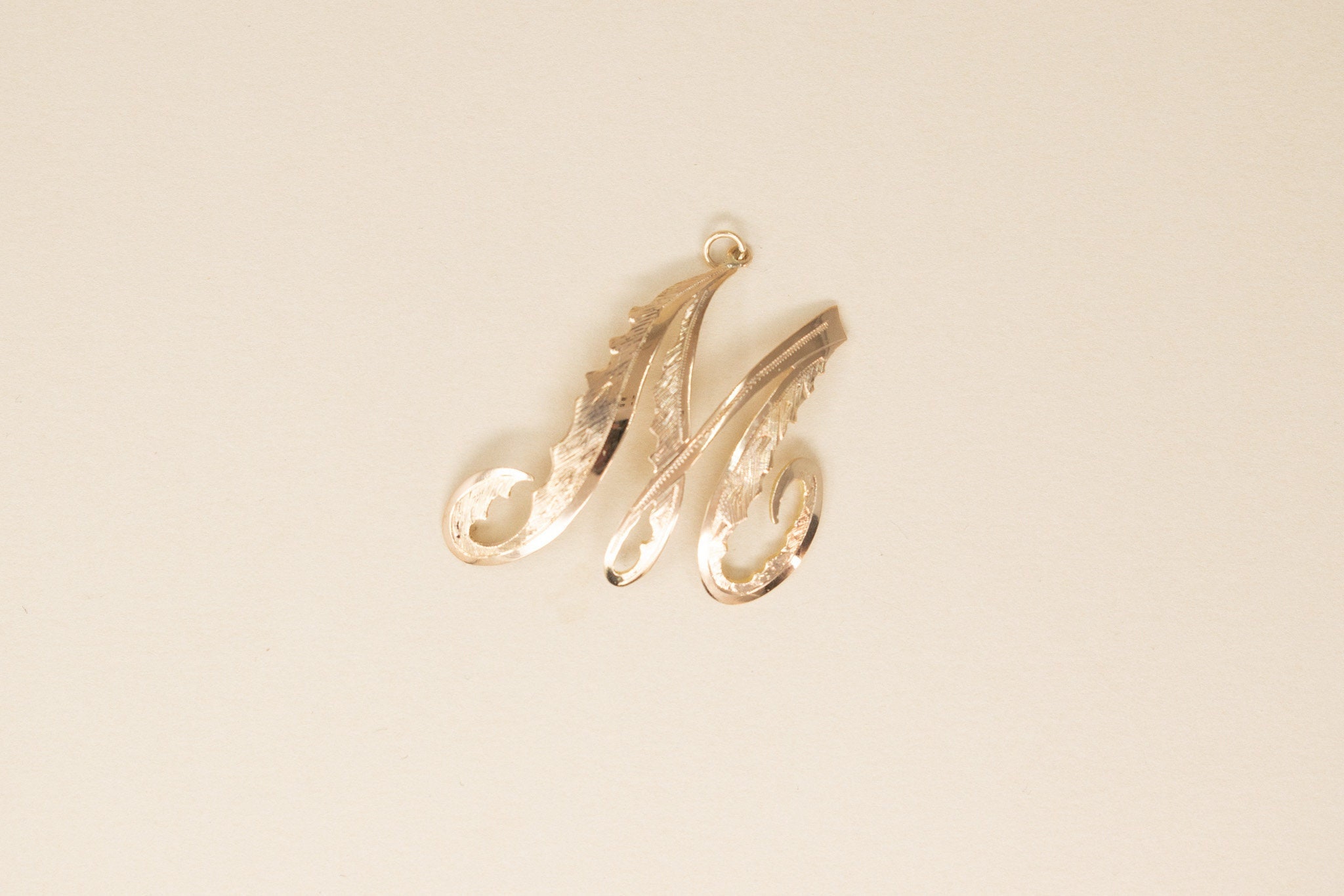 M letter hot sale gold pendant