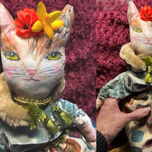 Belinda Cat Doll is handmade with a hand painted cotton face and body. Belinda is a one of a kind, stuffed 20 inch cotton cat doll.