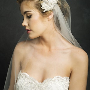 Ivory Bridal Wedding Fingertip/ Waltz single layer 1 tier lace cap veil with rhinestones clips is for sale.