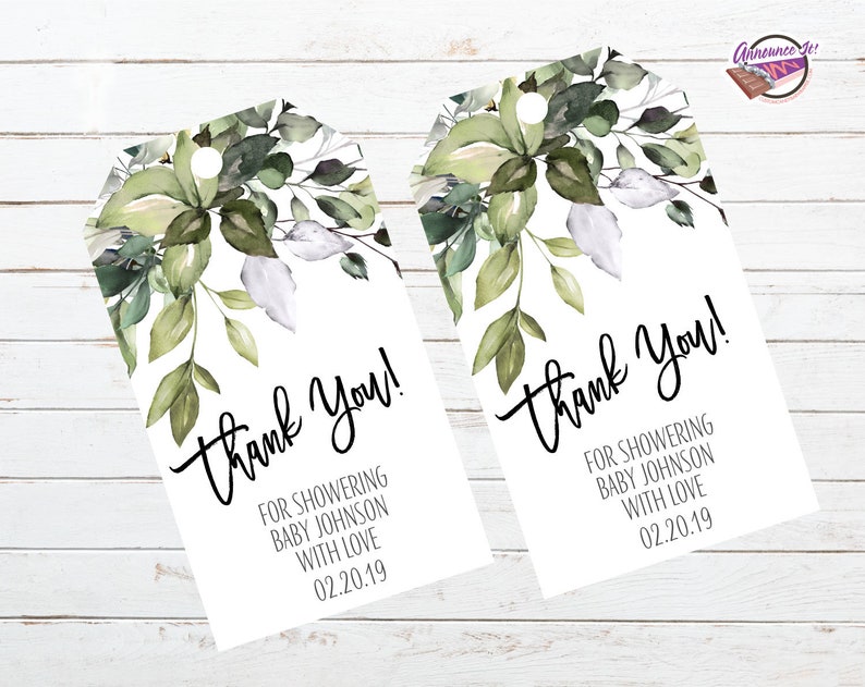 May include: Two white gift tags with a green watercolor floral design. The text on the tags reads "Thank You!" and "For showering Baby Johnson with love 02.20.19".