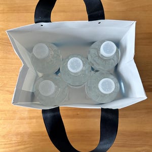 Contents of wedding welcome bag, showing how much it can hold.