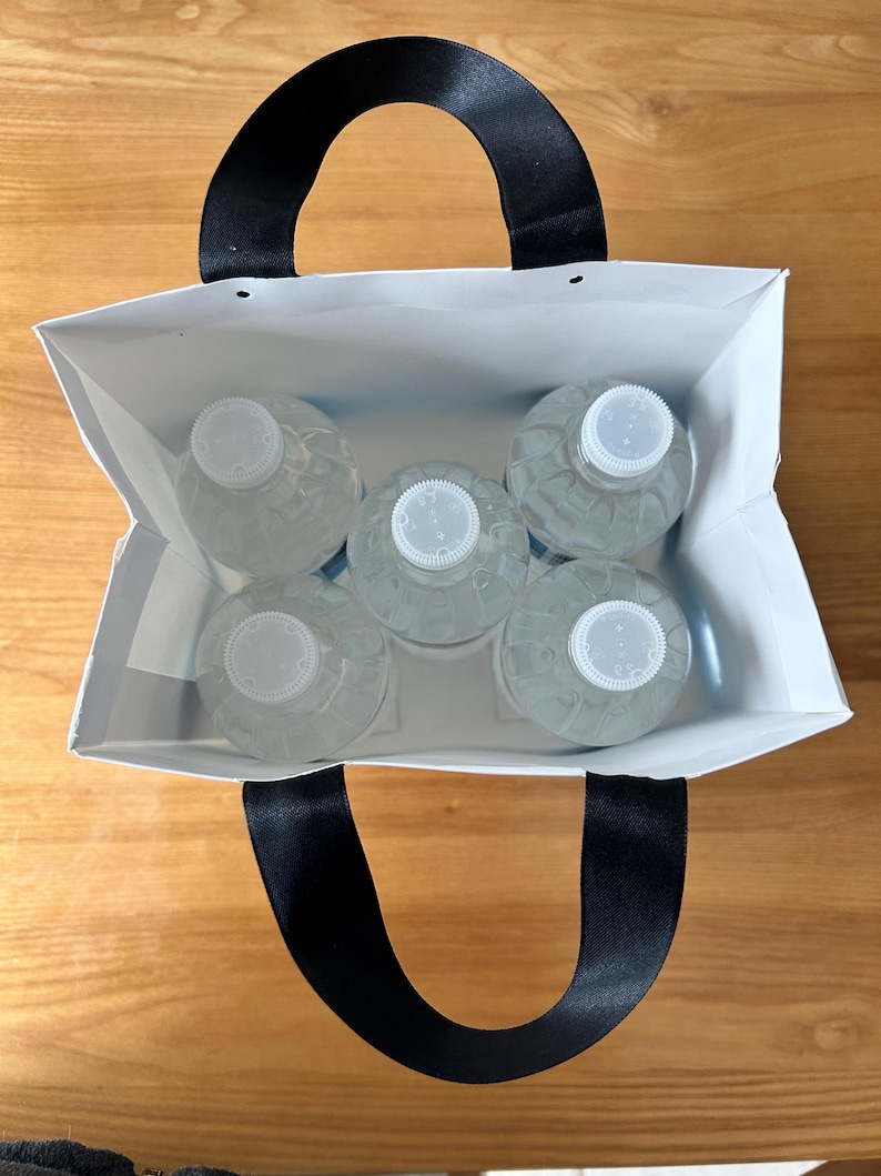 Contents of wedding welcome bag, showing how much it can hold.