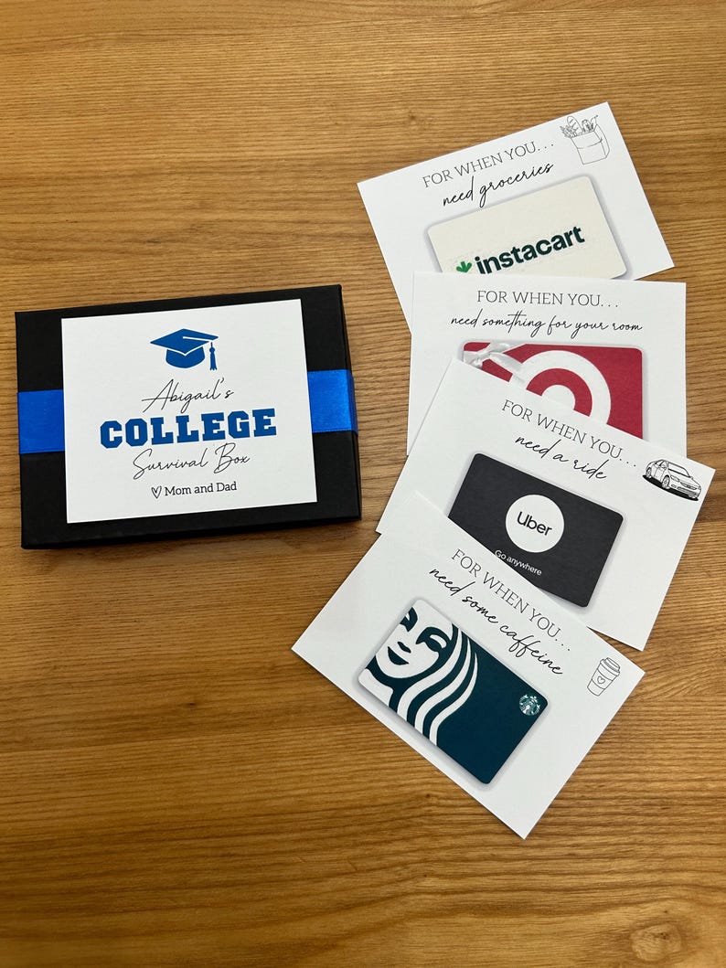 May include: A black box with a blue ribbon and a white label that reads "Abigail's COLLEGE Survival Box." Gift cards for Instacart, Target, Uber, and Starbucks are displayed. The theme is college student essentials.