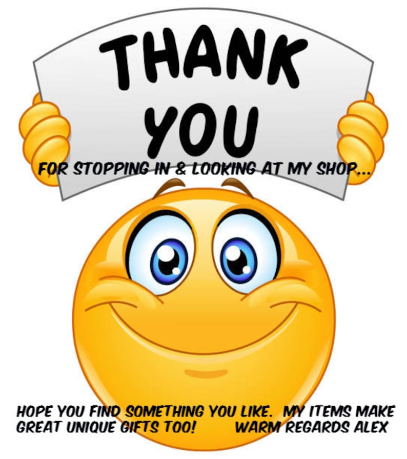 May include: A yellow smiley face emoticon holding a white sign that says "THANK YOU FOR STOPPING IN & LOOKING AT MY SHOP... HOPE YOU FIND SOMETHING YOU LIKE. MY ITEMS MAKE GREAT UNIQUE GIFTS TOO! WARM REGARDS ALEX"
