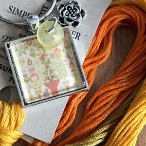 Sampler Blumenkorb - Fadenhalter - Scherenanhänger - Nadelmagnet - Reißverschlussanhänger - Halskette