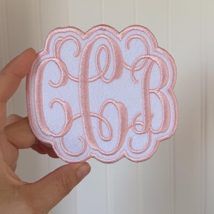 May include: A rustic wooden sign with the text "Welcome to our home" in white lettering. The sign features a distressed finish and a simple, inviting design, perfect for entryway decor.